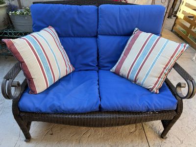 Outdoor Wicker Loveseat with Blue Cushions and Accent Pillows - Patio Furniture Seating