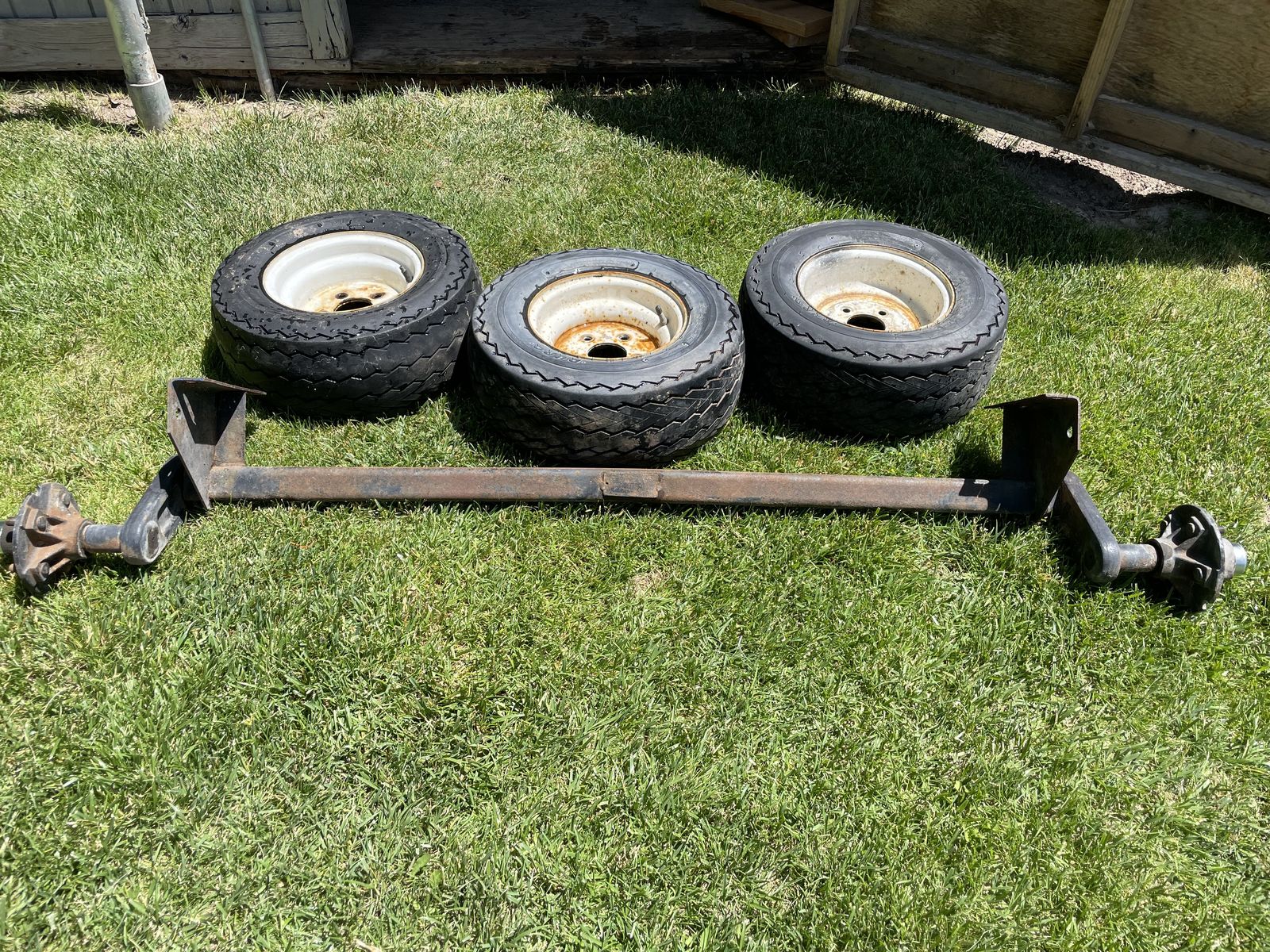 2000 lbs. Torsion axel with tires, rims 120.00
