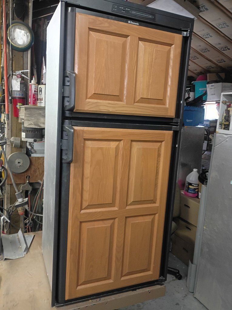 Dometic DM2652RBX RV Refrigerator/Freezer - 6 cu ft, Propane/Electric, Wood Panel Doors