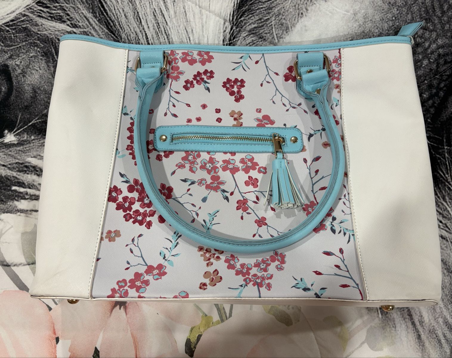 Floral Print Temple Bag Tote with Light Blue Handles and Tassel Accent