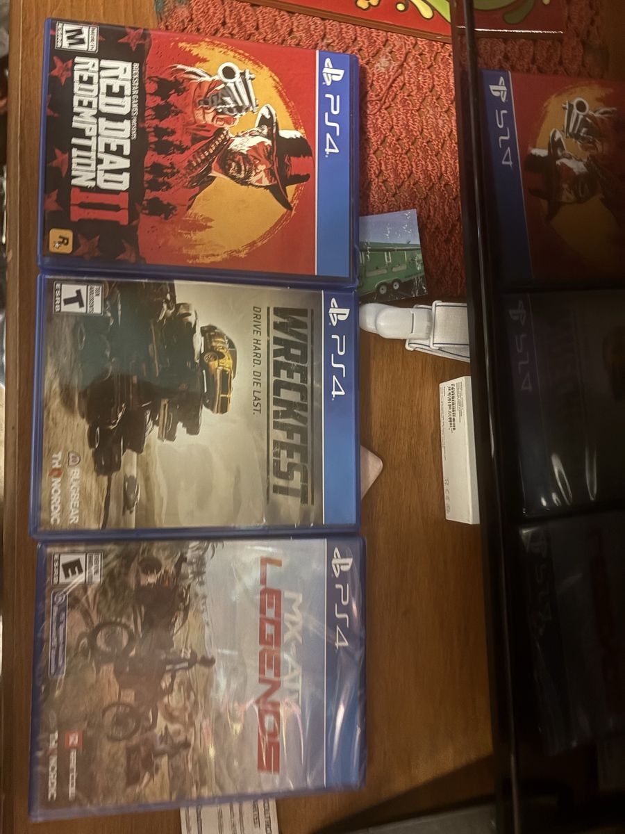 Red Dead Redemption 2, Wreckfest, & MX vs ATV Legends PS4 Game Bundle