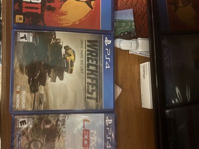 Red Dead Redemption 2, Wreckfest, & MX vs ATV Legends PS4 Game Bundle