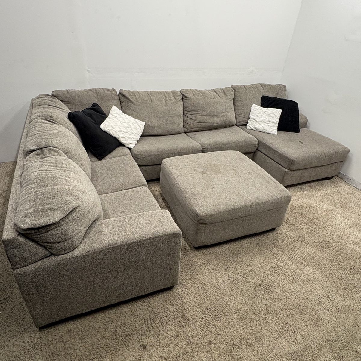Large Grey Fabric Sectional With Ottoman
