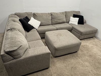 Large Grey Fabric Sectional With Ottoman
