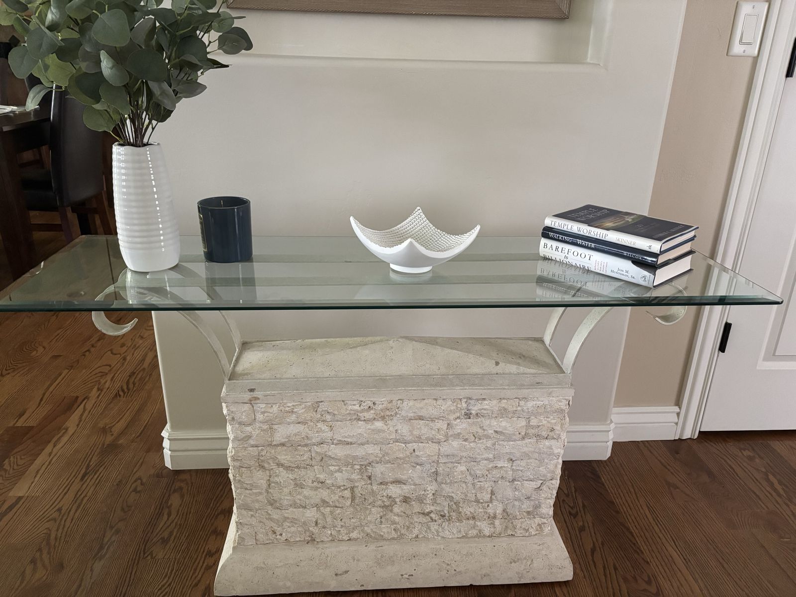 Glass Top Console or Entryway Table with Faux Stone Base and Scroll Metal Brackets