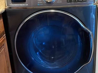 Samsung 5.6 cu. ft. Extra-large front load washer - Steam/super speed/self cleaning