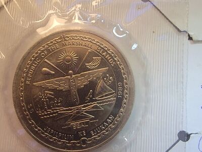 First man on the moon $,5 coin.