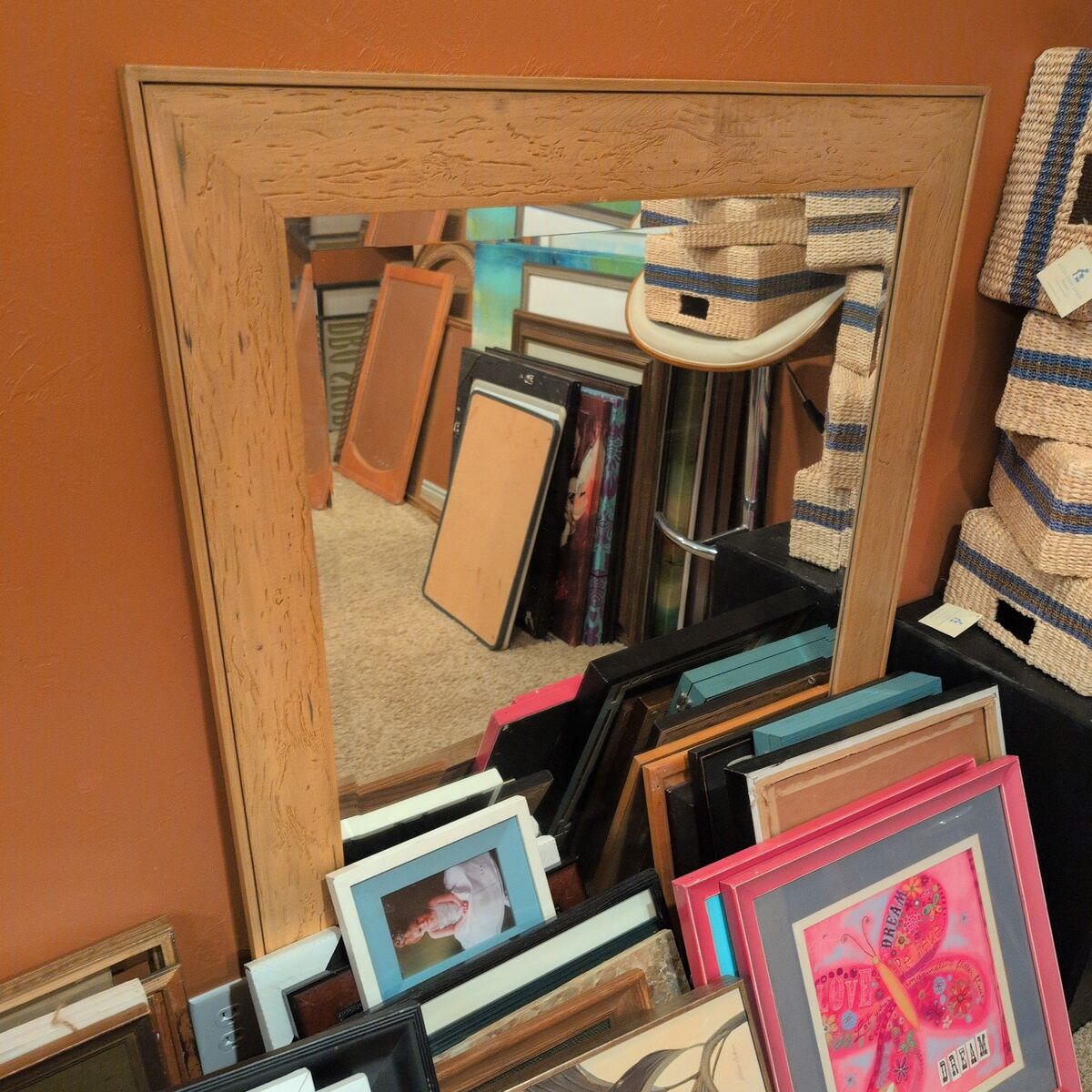 large rectangular wooden mirror