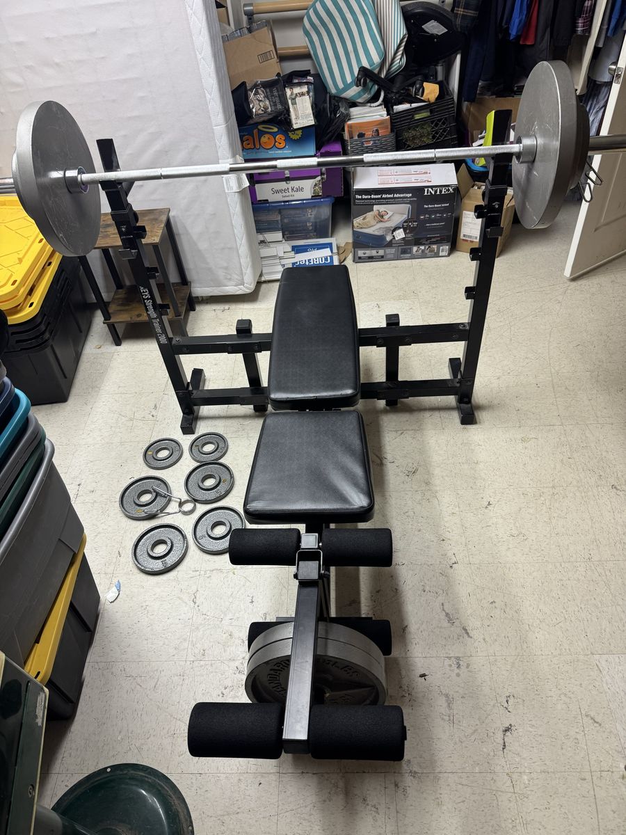 Weight Bench set with variety of weights.