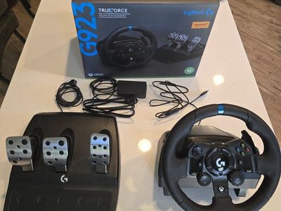Near Mint Logitech G923 Racing Wheel and Pedals for Xbox and PC with TRUEFORCE. msrp $350