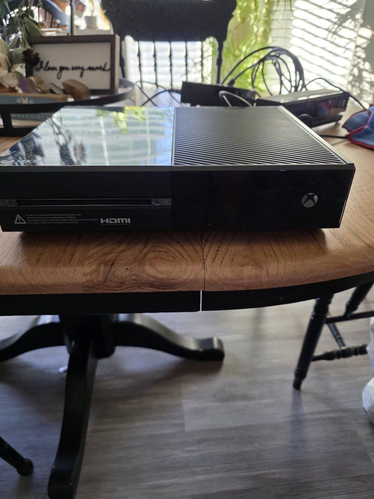 Xbox One console bundle with the Kinect sensor and two wireless controllers.