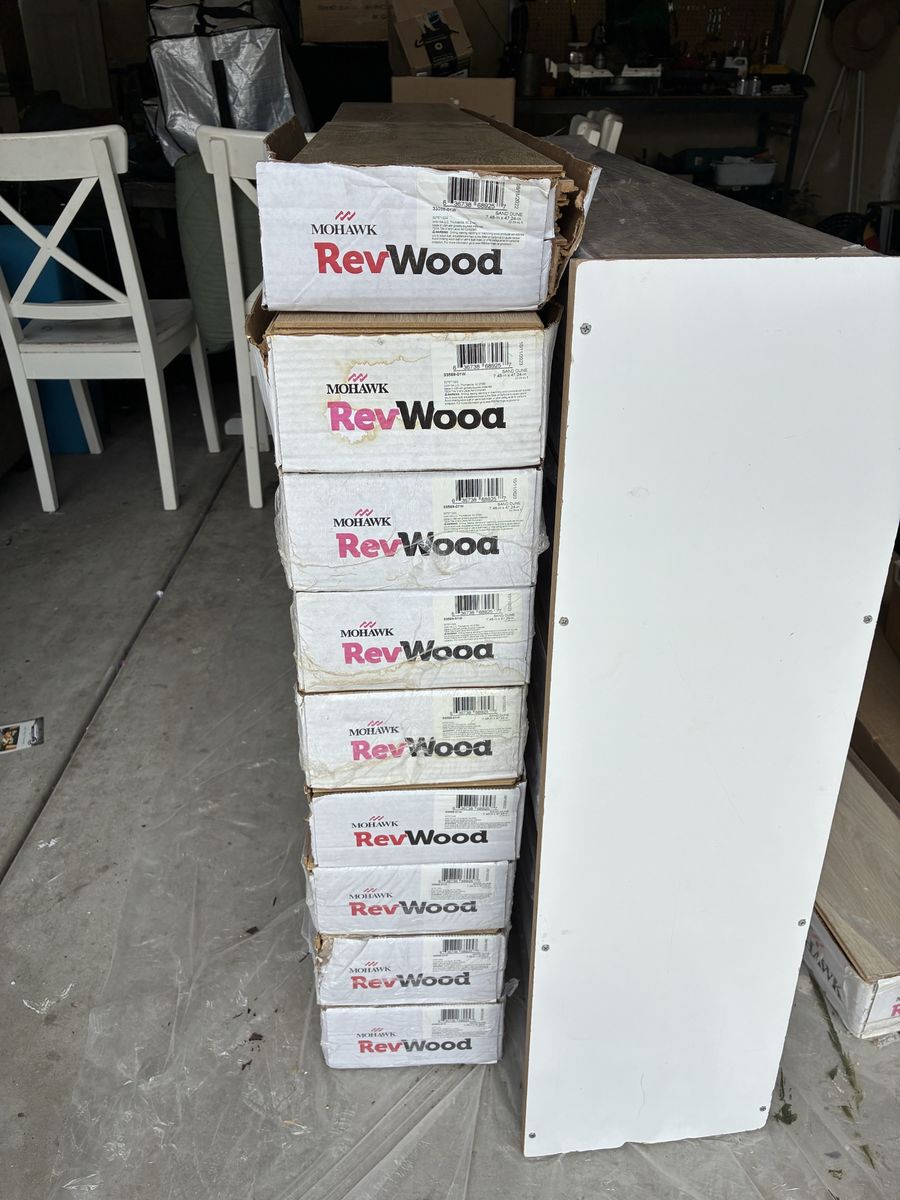9 boxes NEW Mohawk RevWood Sand Dune Laminate flooring 12mm. 22.09 sq ft/box