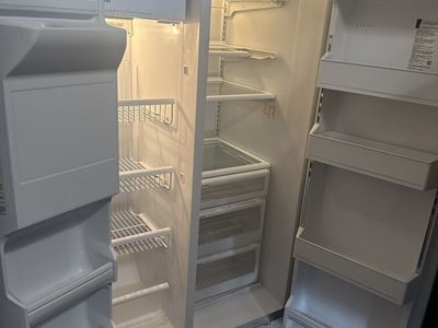 GE Profile White Side-by-Side Refrigerator works great its plug in for u to see $90