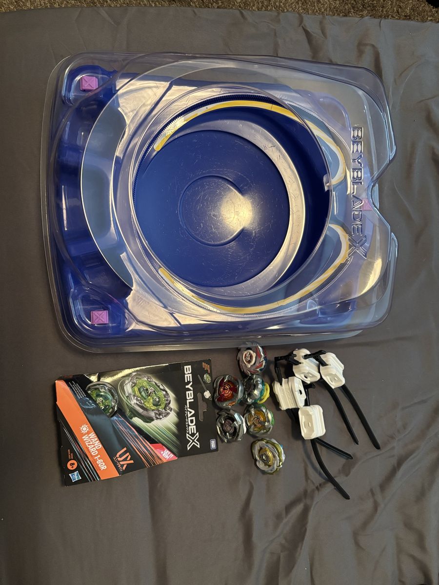 Drop attack stadium with 7 Beyblades!