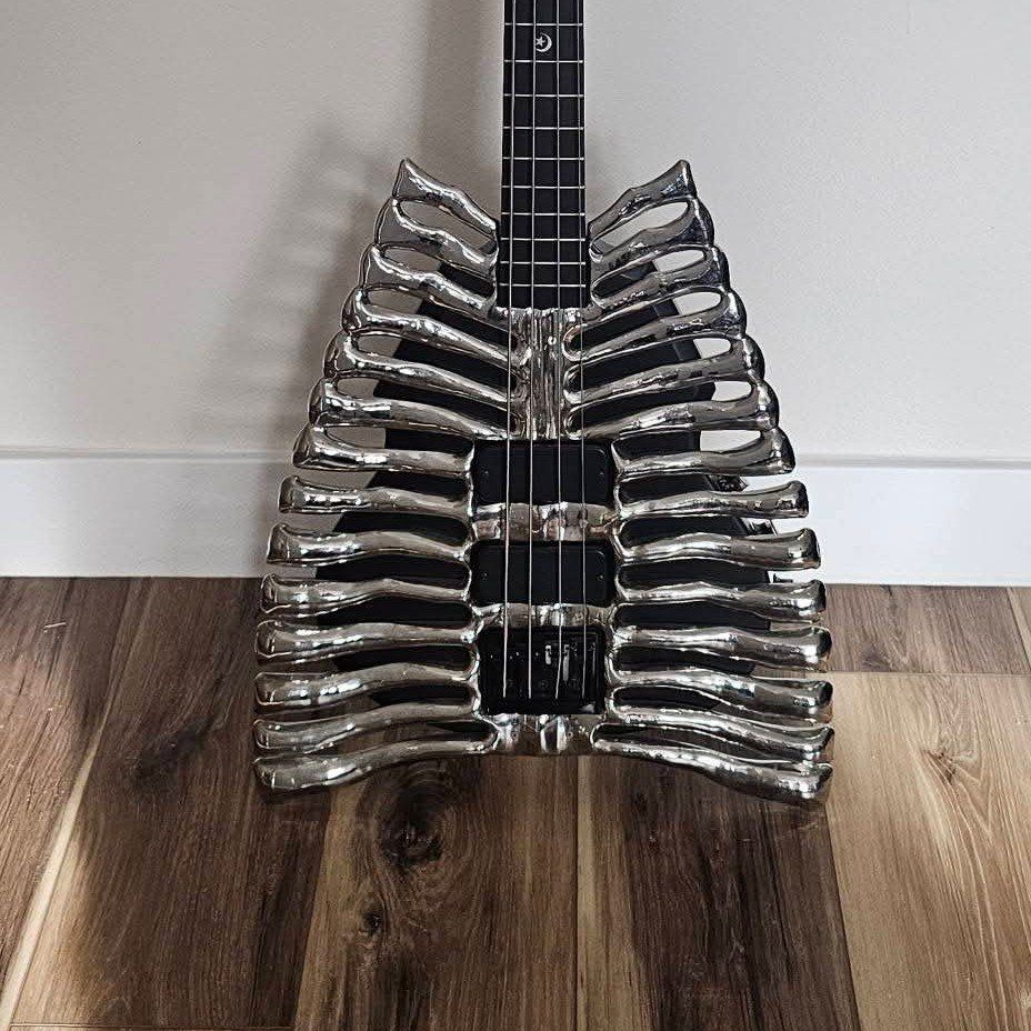 ISO Bass guitar or neck and acoustics for charity