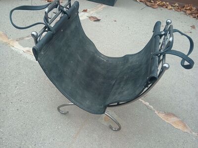 Minuteman log holder and leather carrier