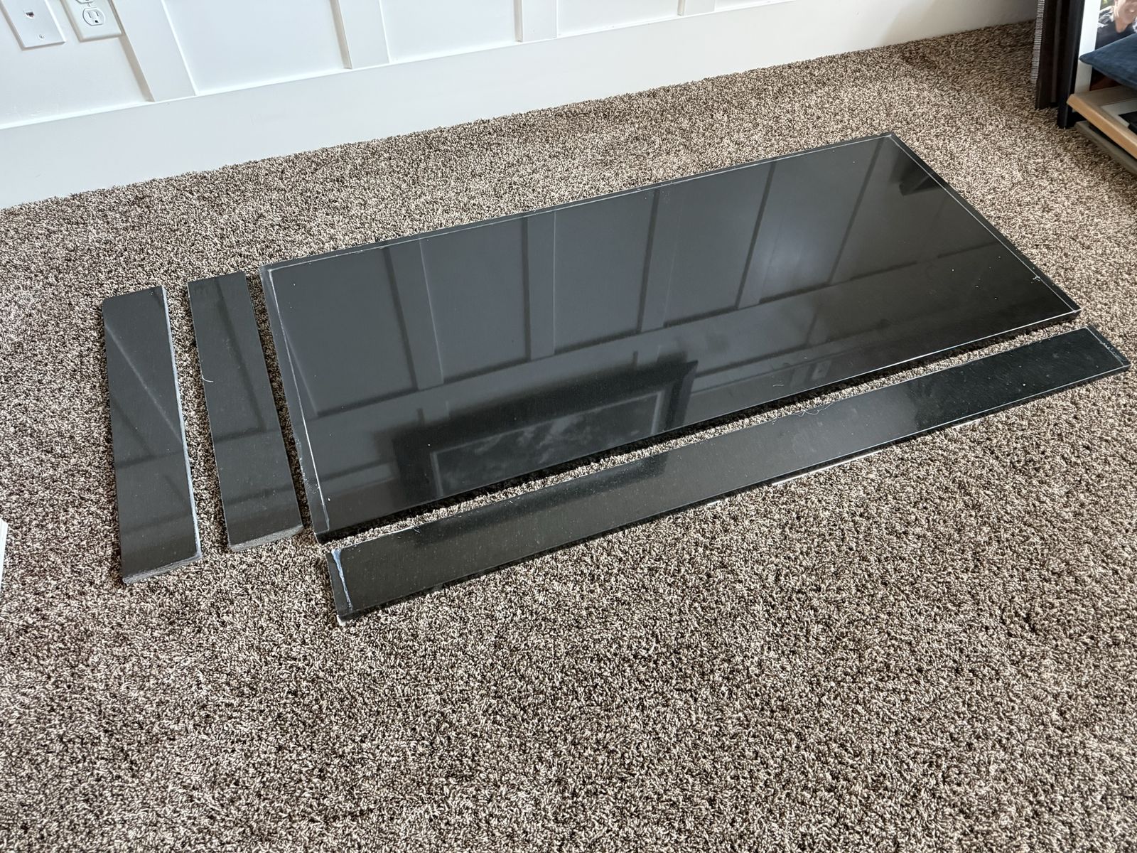 Black Granite Countertop with Matching Backsplash and Sidesplash Pieces