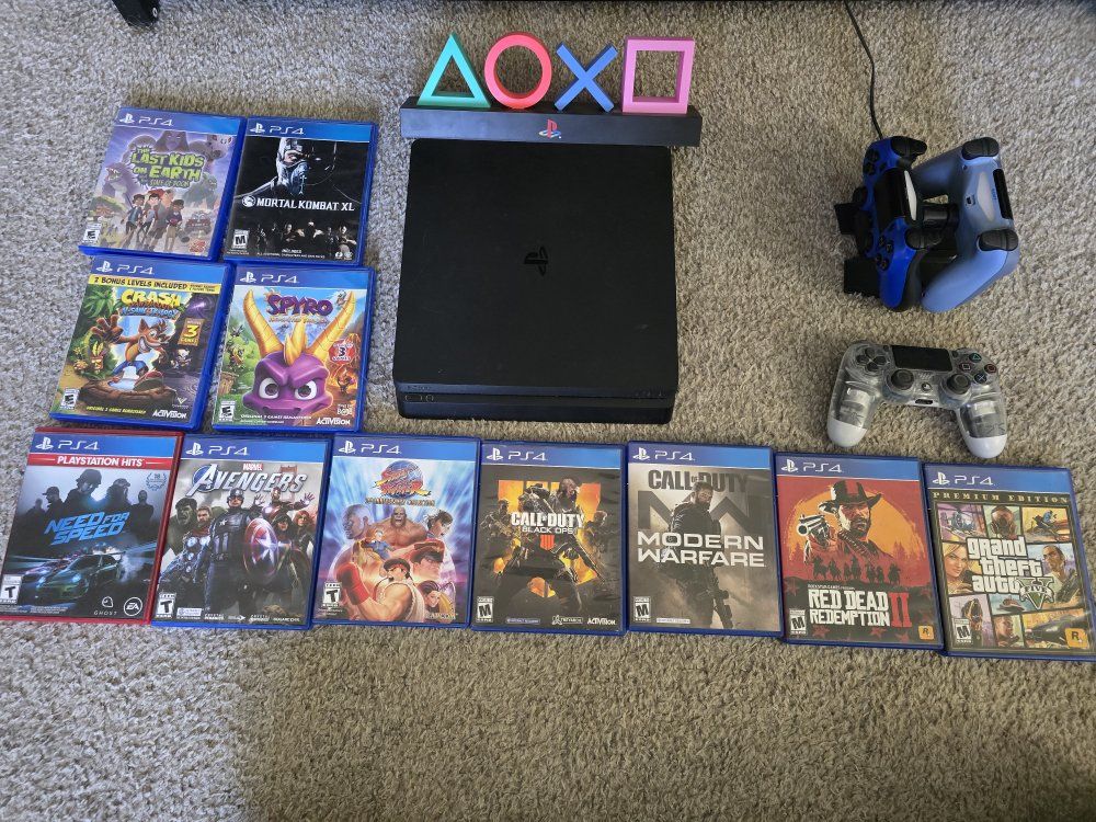 Sony PS4 Slim Console Bundle w/ 3 Controllers, Dual Charging Dock, Playstation light decore, & 10 Games - Great Condition