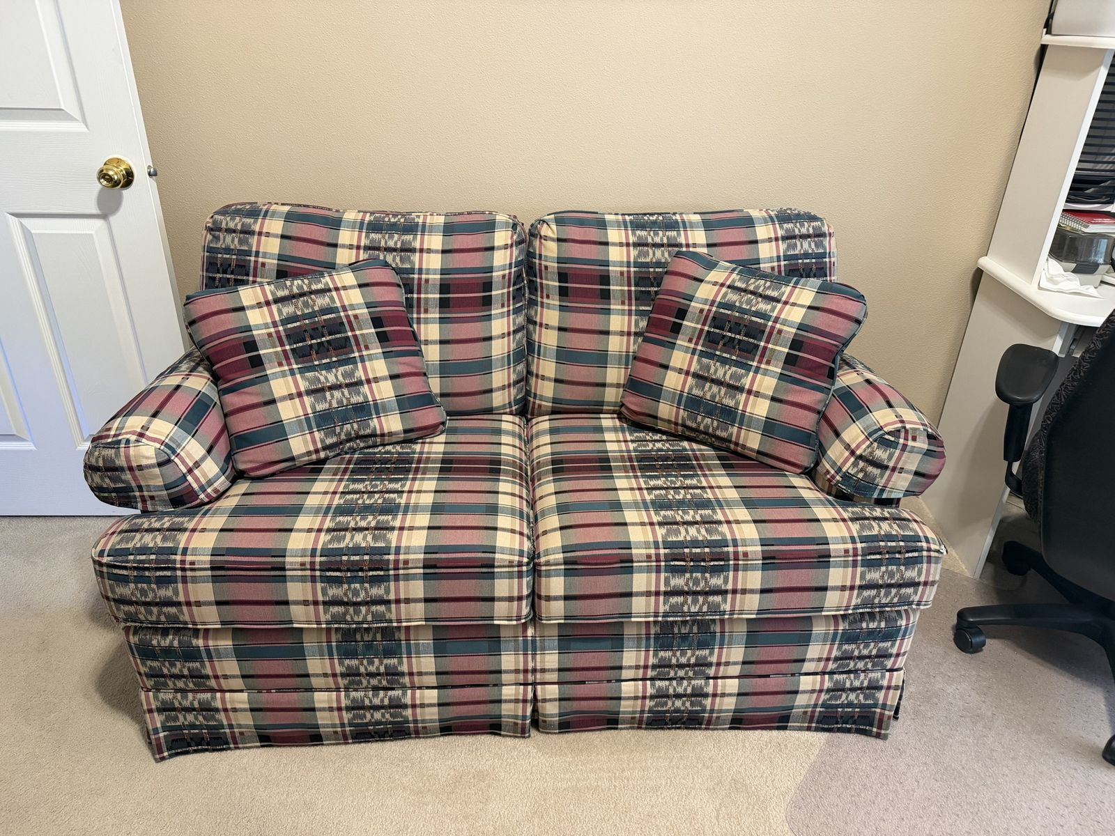 Plaid loveseat with matching pillows