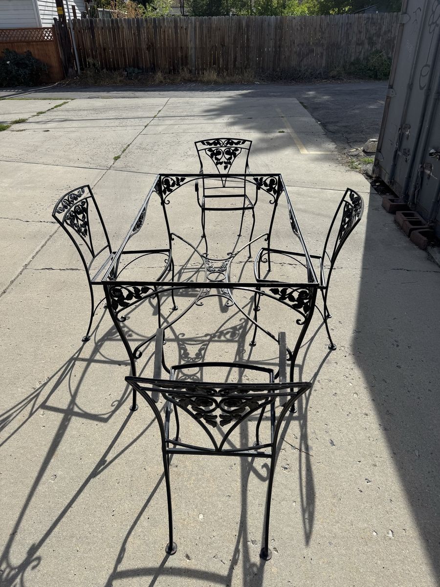 Black Wrought Iron Patio Dining Set with Table and Four Chairs