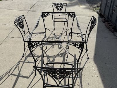 Black Wrought Iron Patio Dining Set with Table and Four Chairs