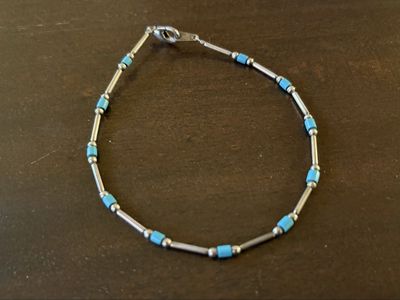 Silver Tone And Turquoise Colored Bracelet