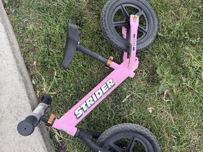 Pink strider balance bike sport