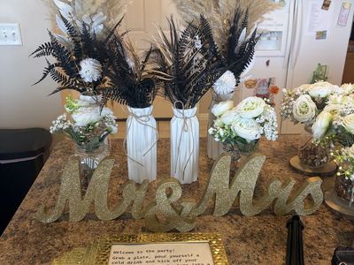 Wedding Decor Centerpieces, Mr & Mrs Sign, and Floral Arrangements