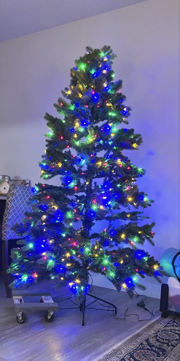 Pre-Lit 6 ft Artificial Christmas Tree with Multicolor and White LED 7 modes Lights and Stand. Bought new last year from HD.