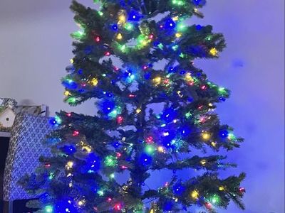 Pre-Lit 6 ft Artificial Christmas Tree with Multicolor and White LED 7 modes Lights and Stand. Bought new last year from HD.