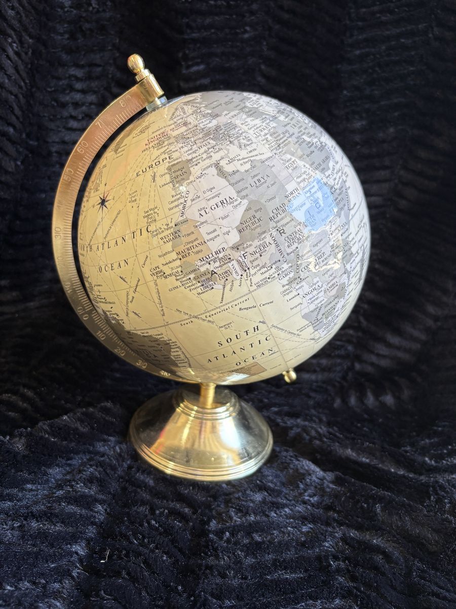 6” decorative desktop world globe with brass-tone stand and world time dial. $25 cash/venmo