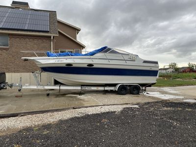 26 ft. Boat with Trailer - 'Only Child' Named Vessel, White & Blue Hull, Ready for the Water