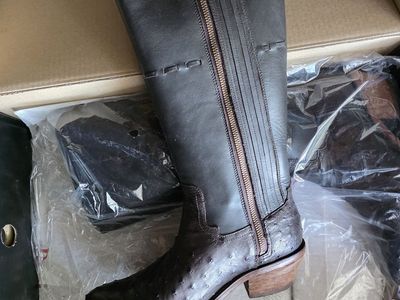 Brand New still in plastic Ostrich Women's Boots, Size 10