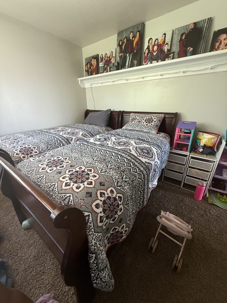 2 twin size Wooden Sleigh Bed Frames with Detailed Headboards and Footboards