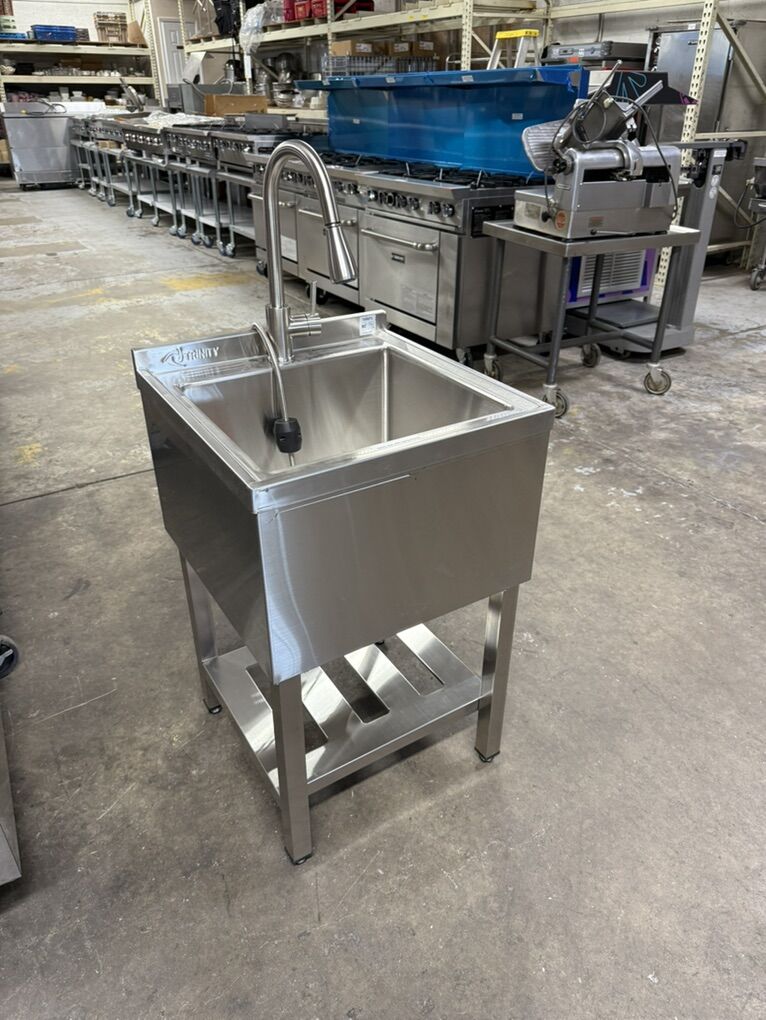New Stainless Steel Utility Sink W/ Spray Faucet ,and underneath shelf NSF approved ,last one in stock .