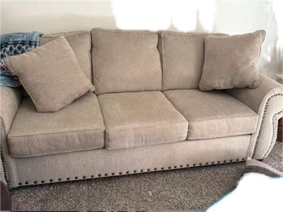 Tan Fabric Sofa with Nailhead Trim - 3-Seater Couch with Rolled Arms and 2 Throw Pillows