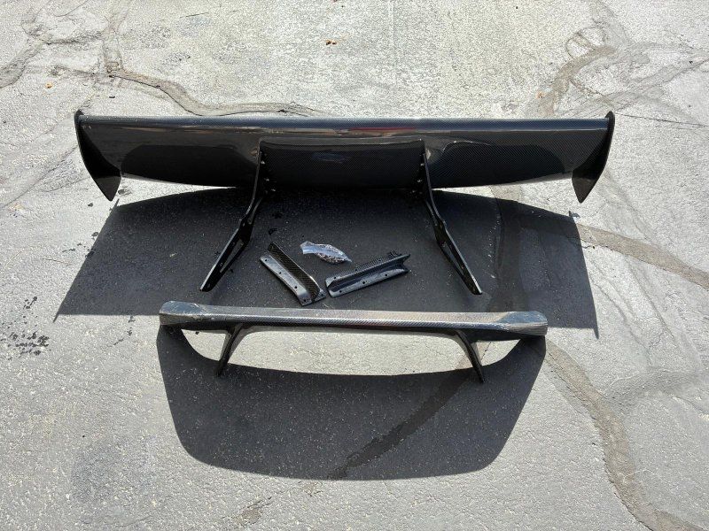 spoiler set . Carbon fiber.  Rear trunk spoiler wing
front Bumper lip splitter .