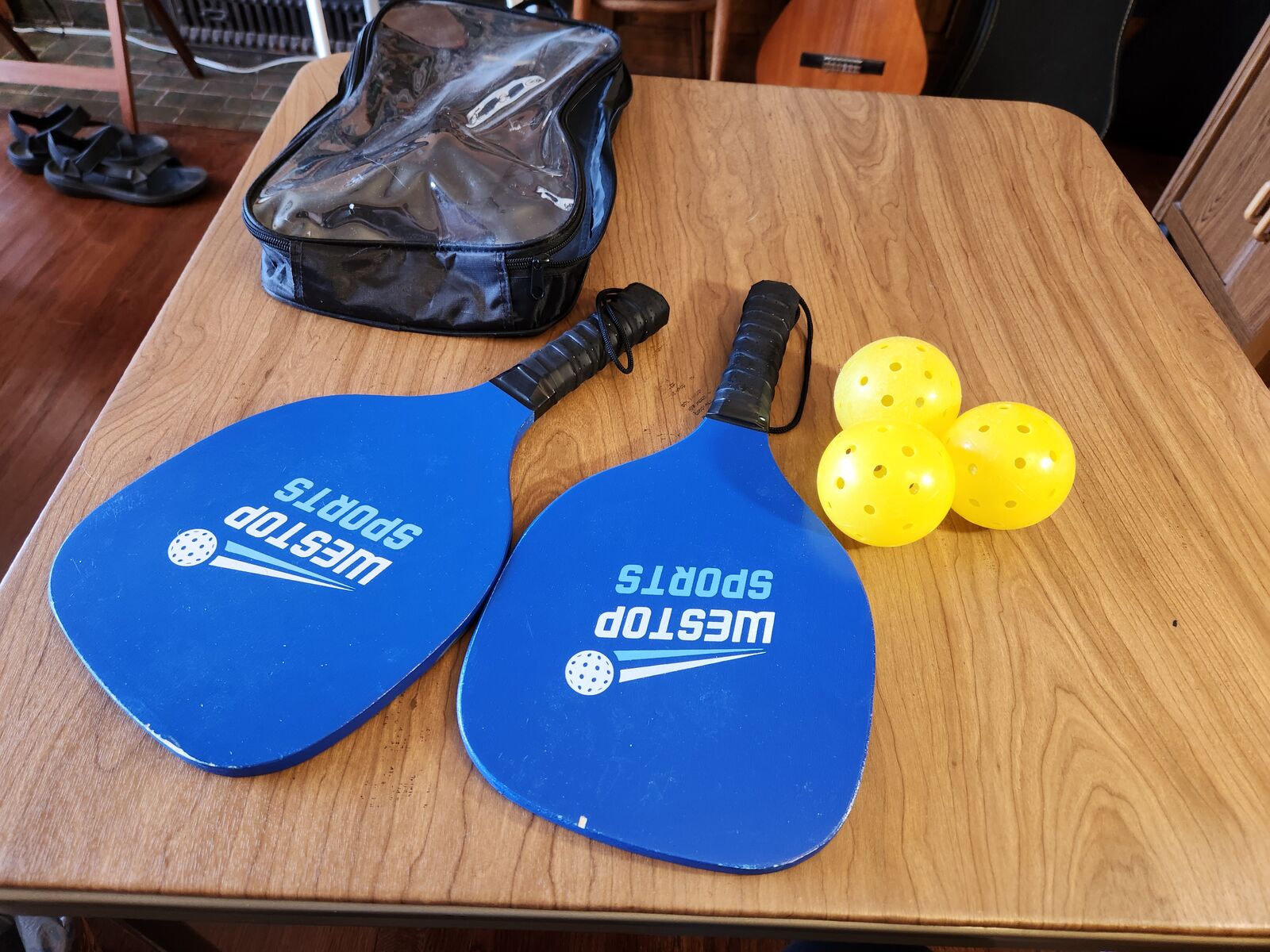Westop Sports pickleball set, 2 paddles, 3 balls, and carrying case.