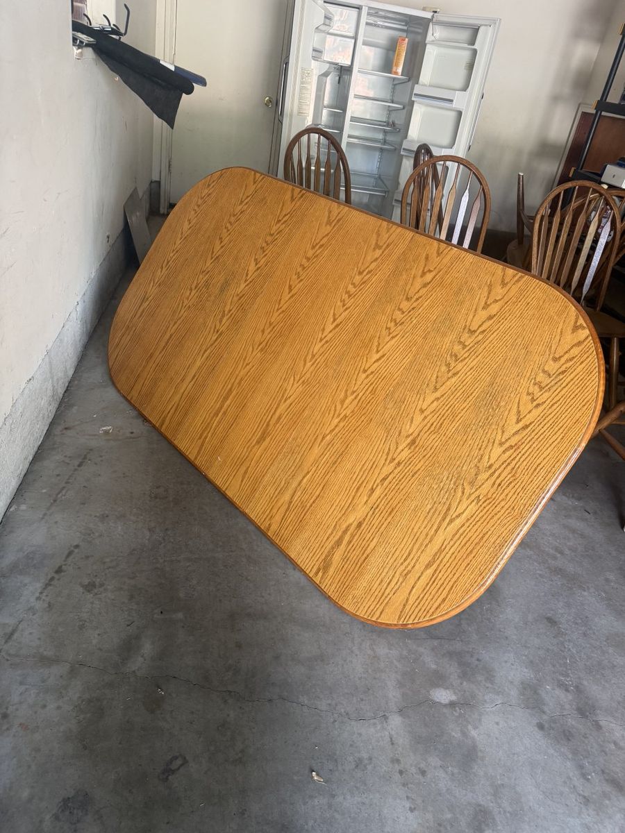 Oak Finish Oval Dining Table with Pedestal Base & Chairs - Used