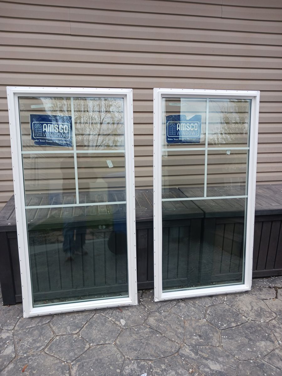 Two twin, paned, vinyl windows
