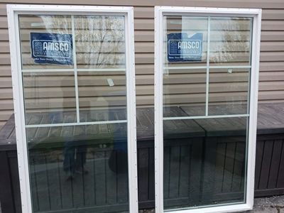 Two twin, paned, vinyl windows