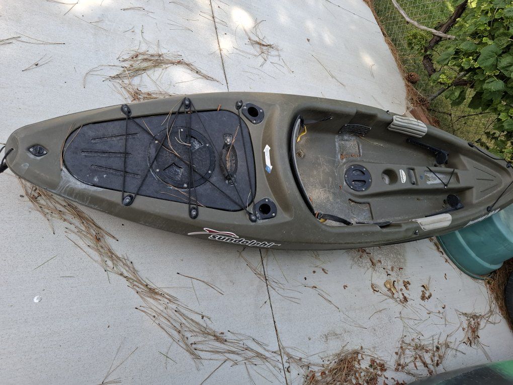 Sun Dolphin Kayak - Olive Green fishing kayak never used. paid 225 yours for $100