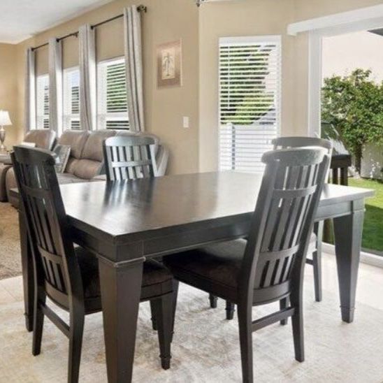 Great condition-Black Wood Dining Table with 6 Chairs - Extendable table piece Included!