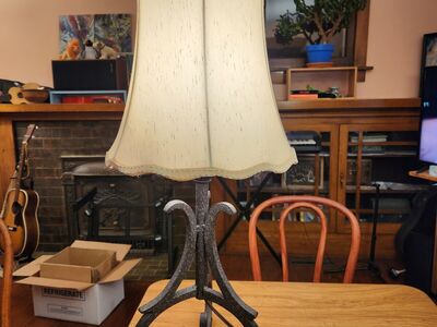 Nice cast iron table lamp. Works great, very solid. Quality iron.