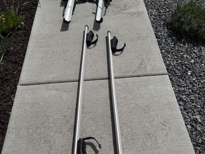 Thule universal cross bars and 2 bike racks with locks!