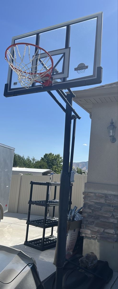 Lifetime Portable Basketball Hoop - Adjustable Height, Clear Backboard