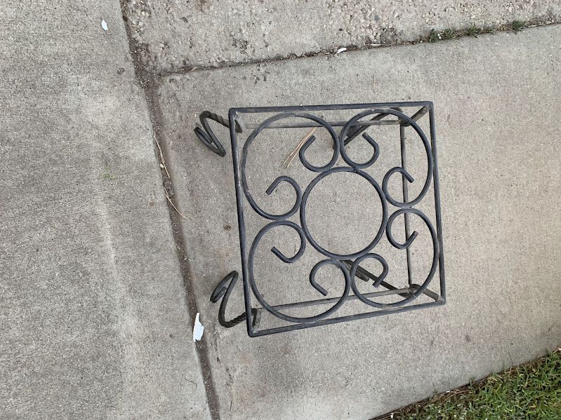 Black metal plant stand