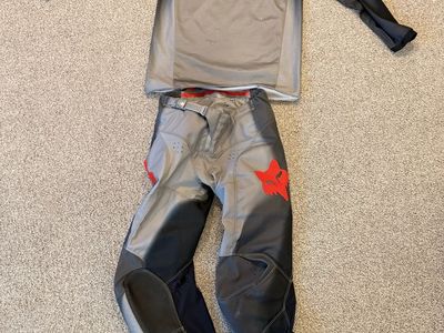 Fox Racing 180 Motocross Gear Set Black/Grey/Red Dirt Bike Jersey (Youth XL) & Pants (Youth 28)