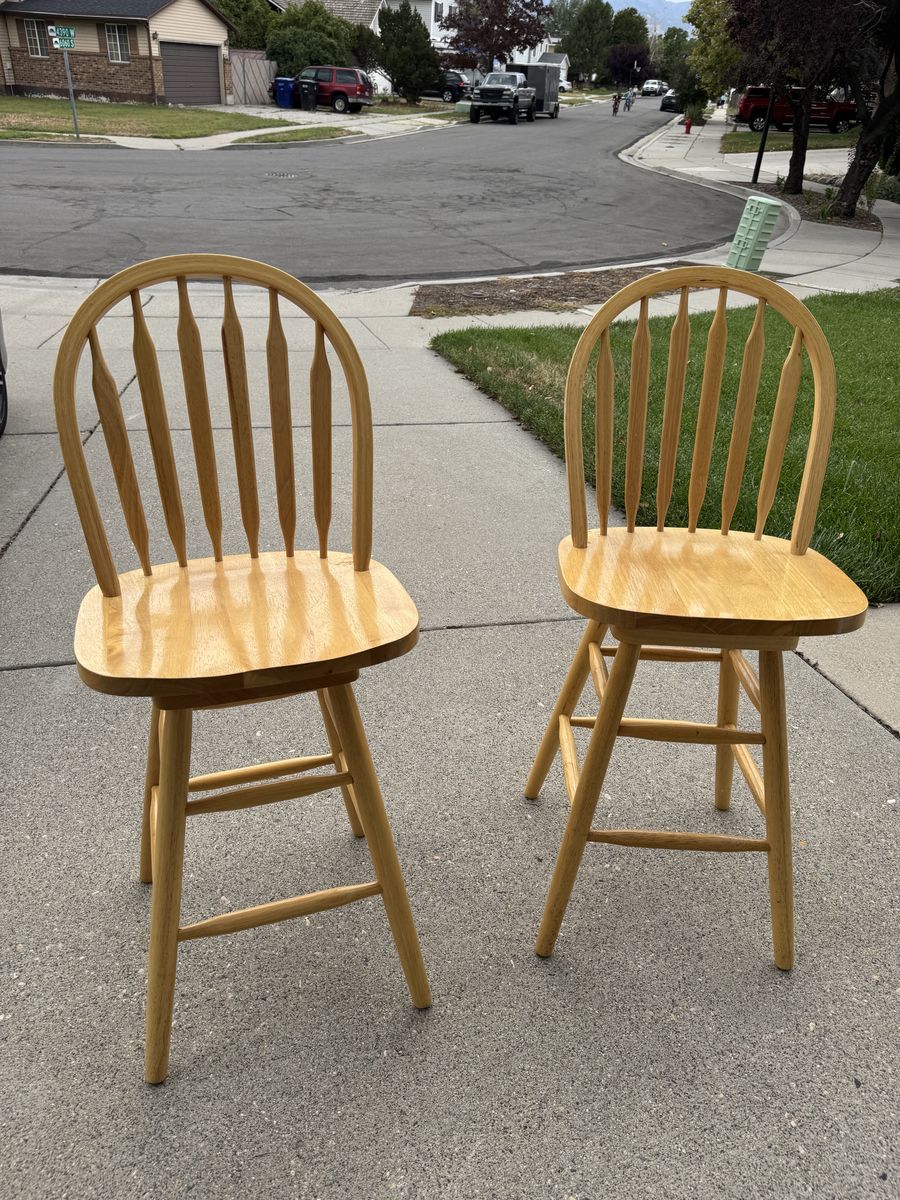 Two Wooden Swivel Bar Chairs