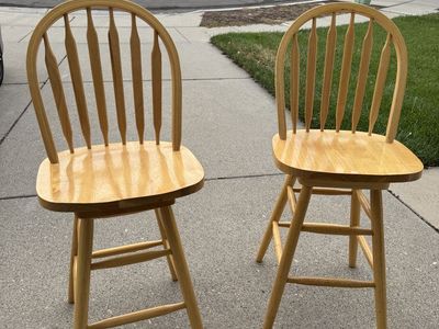 Two Wooden Swivel Bar Chairs